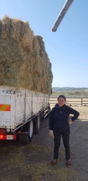 Early March hay delivery with regular volunteer Anna